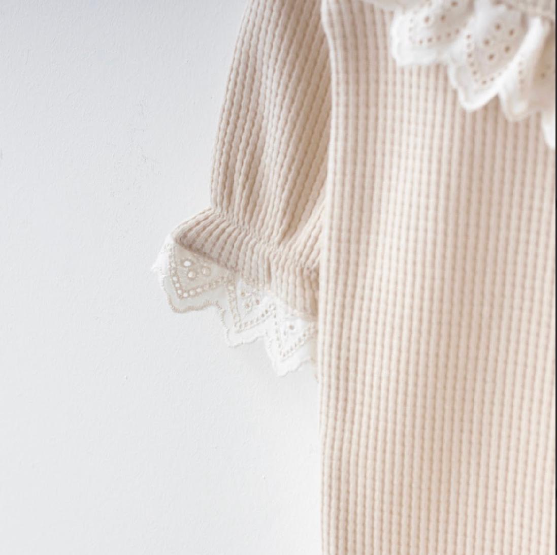 KOMBINEZON I TRAKA SA KARNERIMA